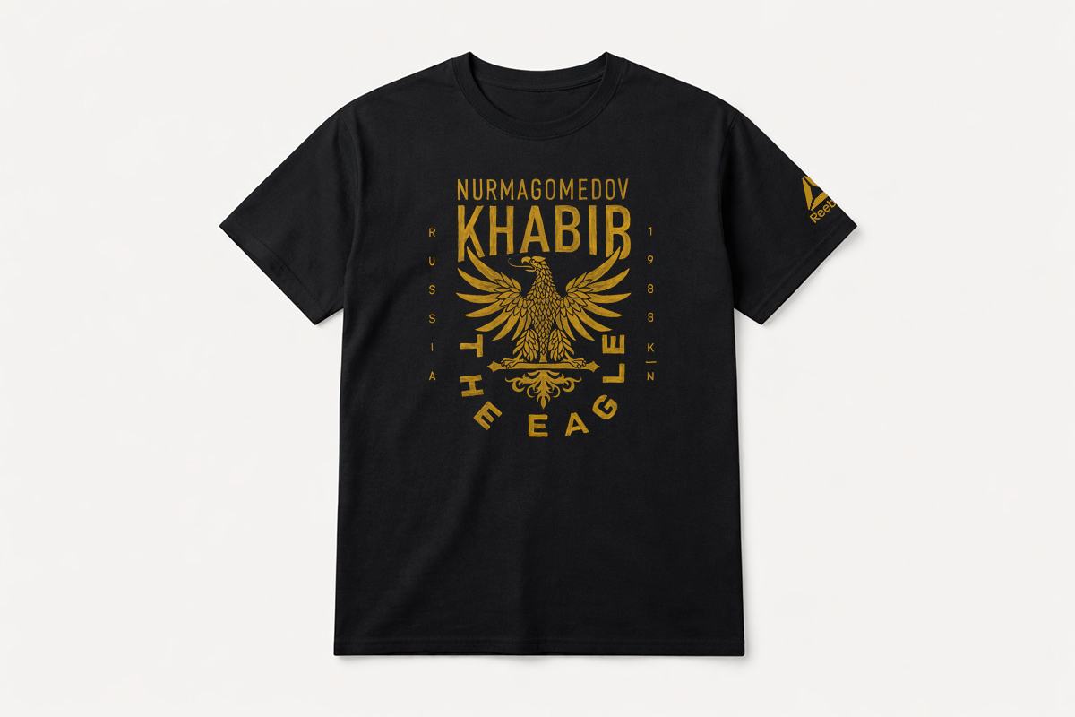 Reebok UFC Khabib Nurmagomedov tee second apparel graphic — bold brush-painting by BMD Design, hors collection capsule MMA fighter tribute